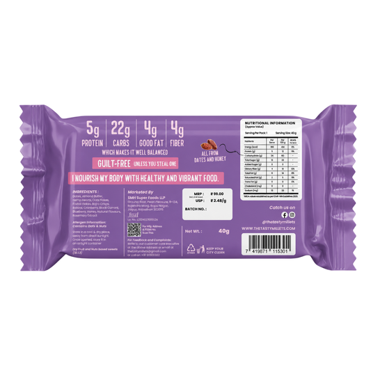 The back of a purple packaged snack bar, showing nutritional information, ingredients, and a barcode on a plain white background.