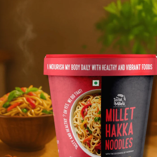 Millet Hakka Noodles container with a bowl of noodles in the background