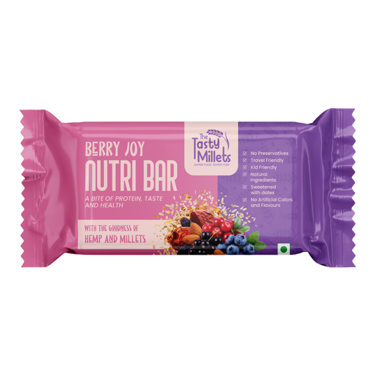 A wrapped Tasty Millets Berry Joy Nutri Bar on a plain white background. The packaging is a gradient of pink and purple with white text and an illustration of mixed berries, nuts, and grains.