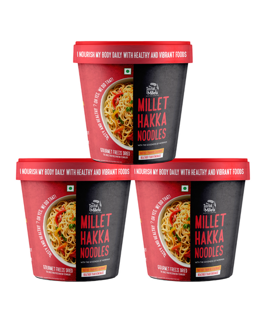 Three containers of Millet Hakka Noodles with red and black packaging on a white background